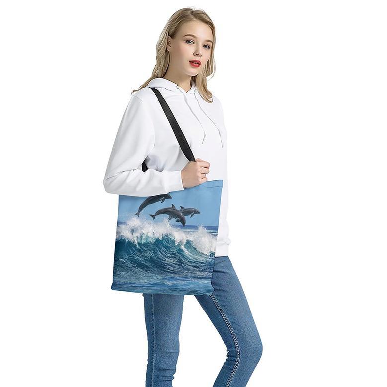 Dolphins Jumping Over Waves Print Tote Bag