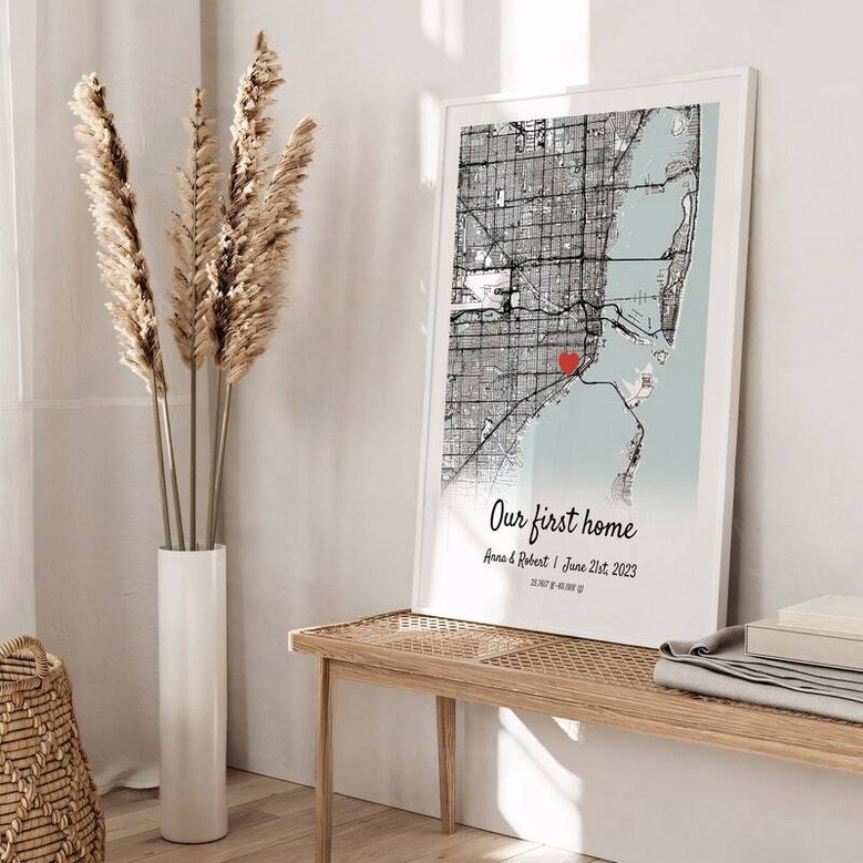 Personalized city map canvas Our First House in black and white with heart location pin, custom names and date—new home gift.
