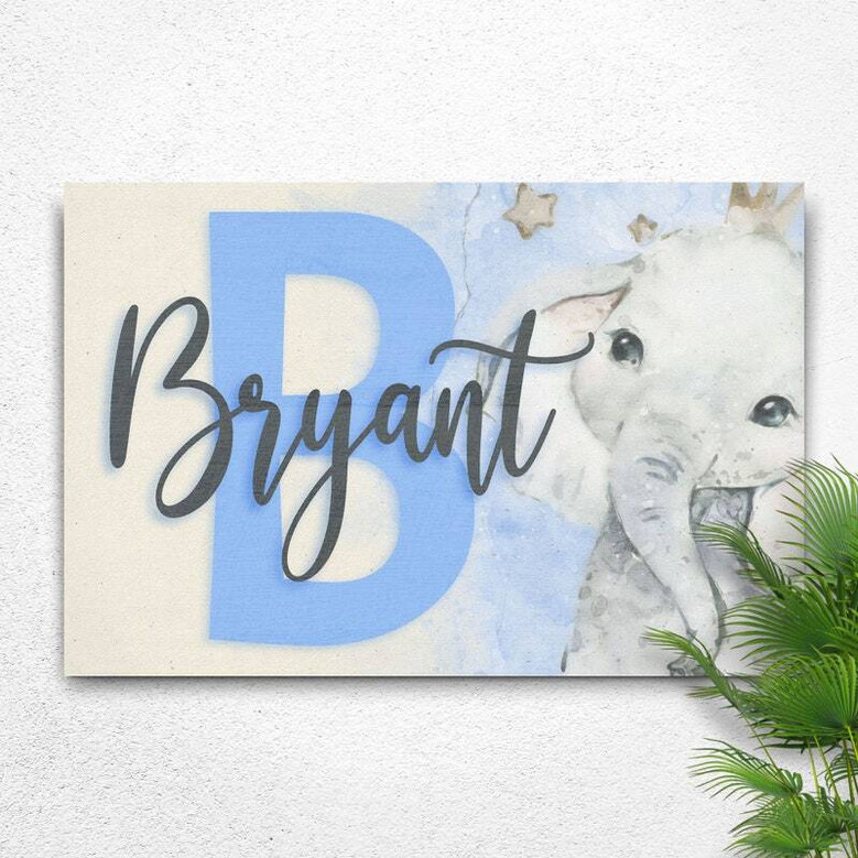Elephant nursery canvas wall art in minimalist gray, custom baby name design for safari-themed bedroom or nursery decor.
