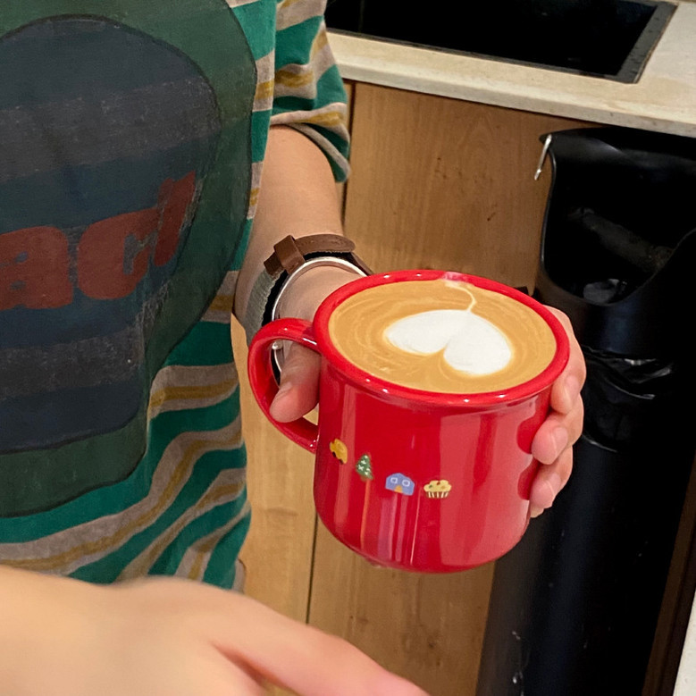 Festive Red Ceramic Coffee Mug for New Year's Celebration