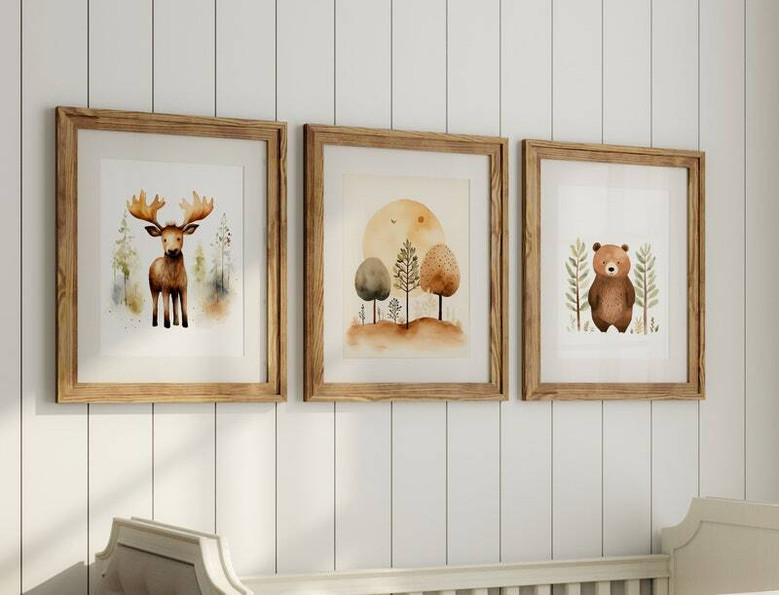 Earth-toned woodland canvas art of bear and moose prints, neutral nursery wall decor ideal above a crib in a kids' room