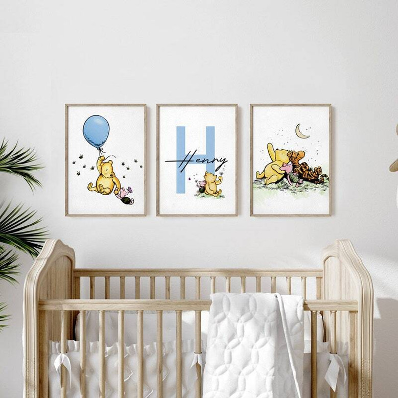 Classic Pooh Bear canvas set in muted sage and cream, customizable name and quote, charming wall art for a baby’s room.