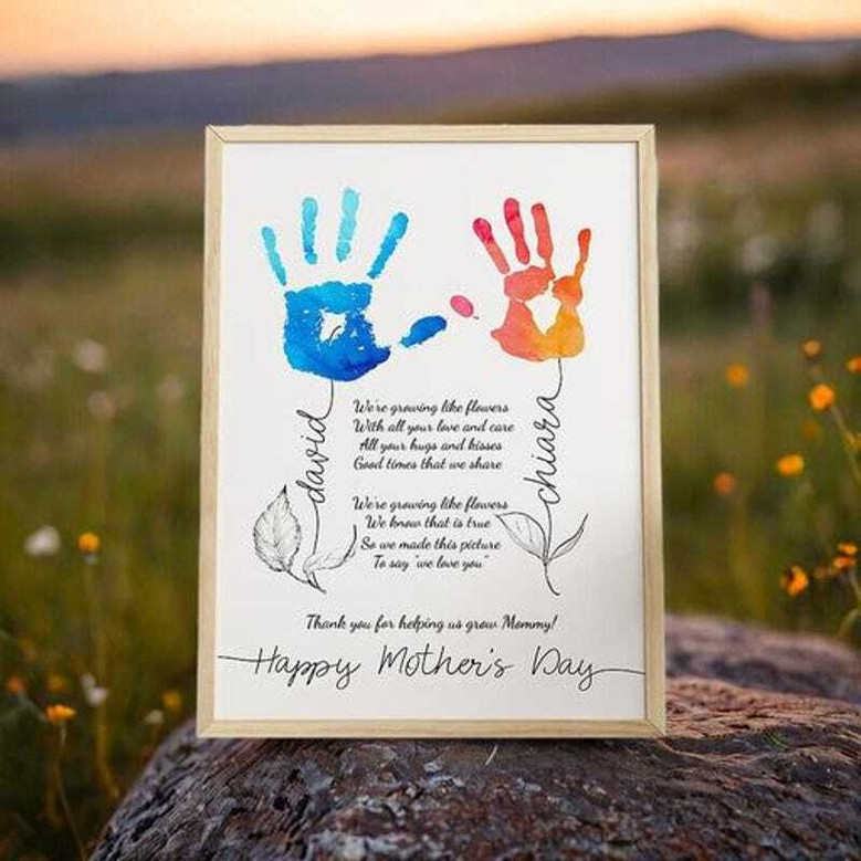 Mother's Day canvas with children's handprints and poem in cursive, personalized names and date, pastel pink tones, square