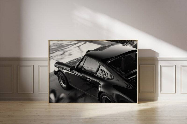 Classic German sports car canvas, black and white rear view with subtle motion blur, striking wall art for modern living room