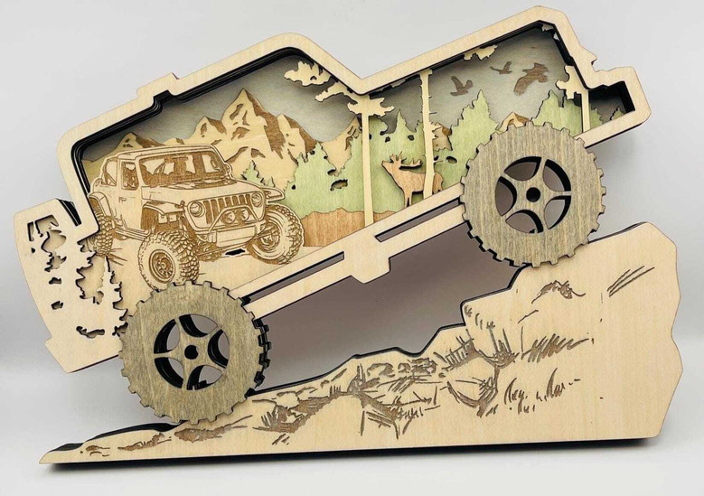 Off-road Jeep wall art with 3D laser-cut mountain panorama, layered depth, pine trees, and trail details for outdoor lovers