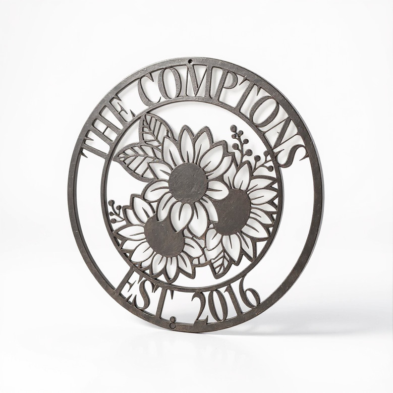 Sunflower metal sign personalized with family last name, round wall art in black powder-coated steel, farmhouse gift