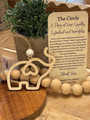 Elephant family ornament, simple maple wood design symbolizing sisterhood and friendship, with card and storage pouch.