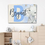 Elephant nursery canvas wall art, personalized with baby name in safari theme for bedroom decor or baby shower gift.