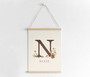 Woodland nursery canvas art with rustic burlap look, custom monogram initial and name, soft neutral tones for baby's room Woodland nursery canvas art with rustic burlap look, custom monogram initial and name, soft neutral tones for baby's room