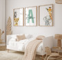 Safari nursery canvas set in soft watercolor, personalized with child name; lion, elephant, giraffe, zebra jungle art