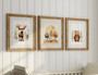 Earth-toned woodland canvas art of bear and moose prints, neutral nursery wall decor ideal above a crib in a kids' room