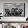 Elephant family canvas art featuring an African herd on the savanna in warm earth tones, ideal for living room display